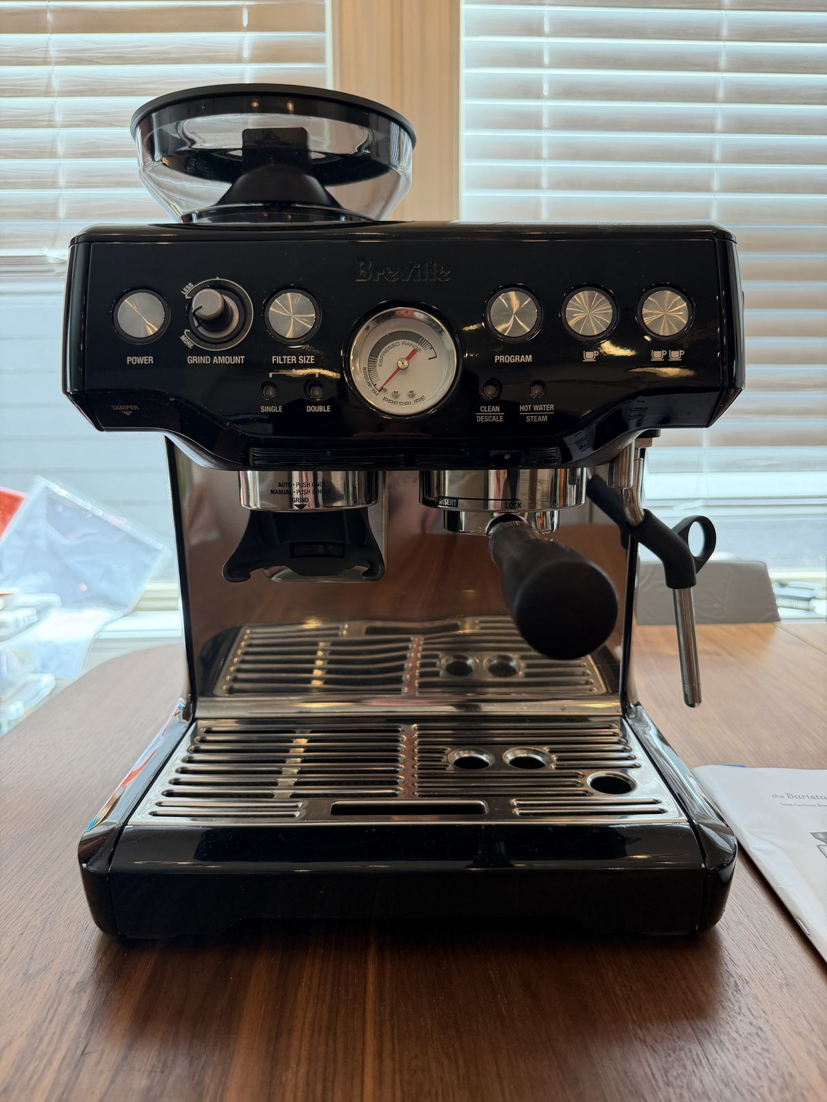 Breville Barista Express in Black Sesame, front view, clean and ready